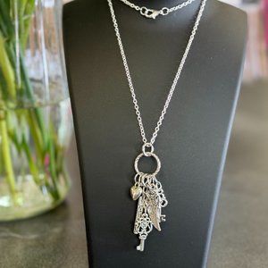 One of a kind, Handmade Steampunk Necklace. 20" Shiny Silver Chain with charms.